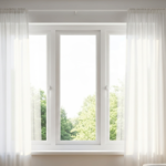 White uPVC double glazed sliding window in a Perth living room